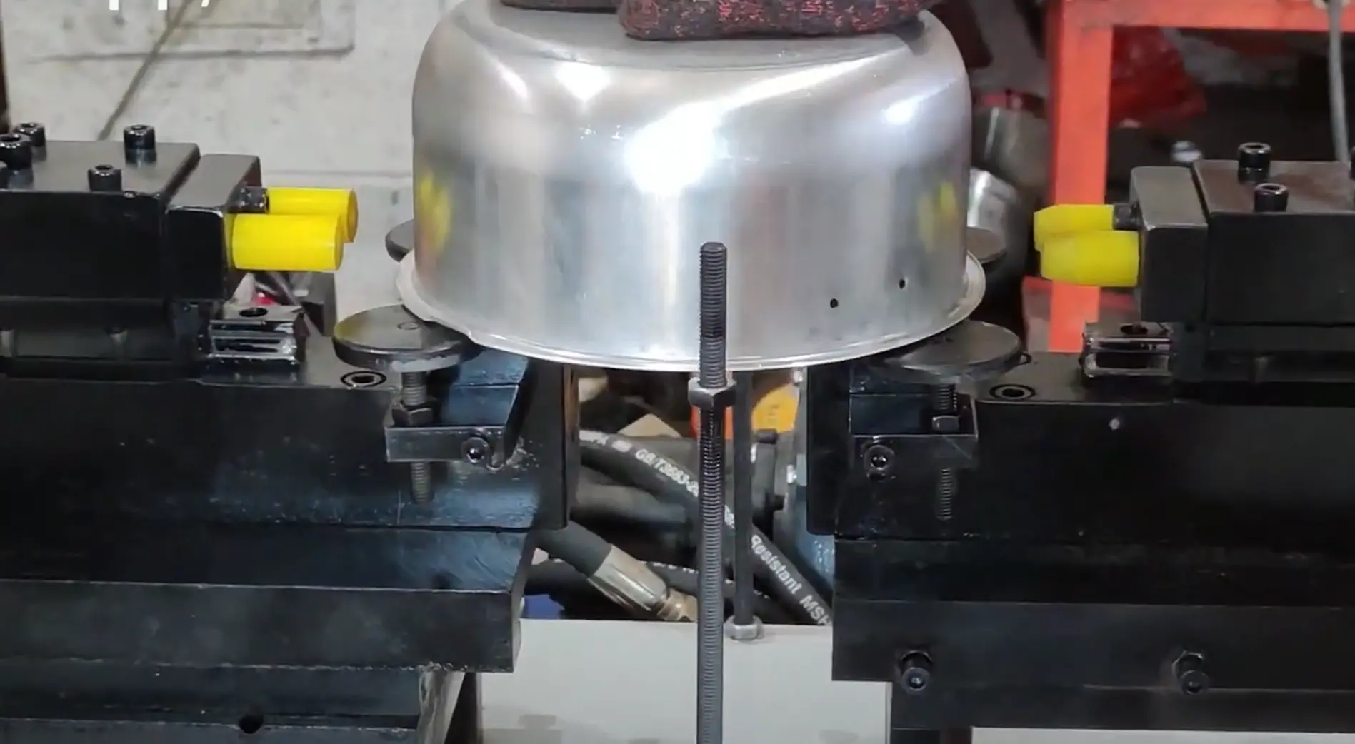 Stainless steel cookware manufacturing step 5 — punching holes in stainless steel pots